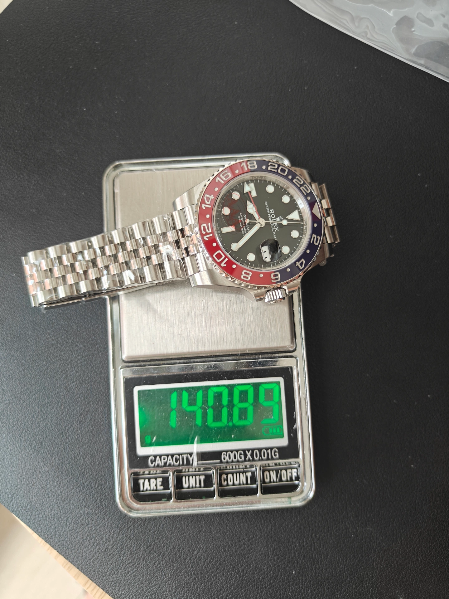 VSF Pepsi GMT-Master II Jubilee version weighing 140.89 grams on digital scale