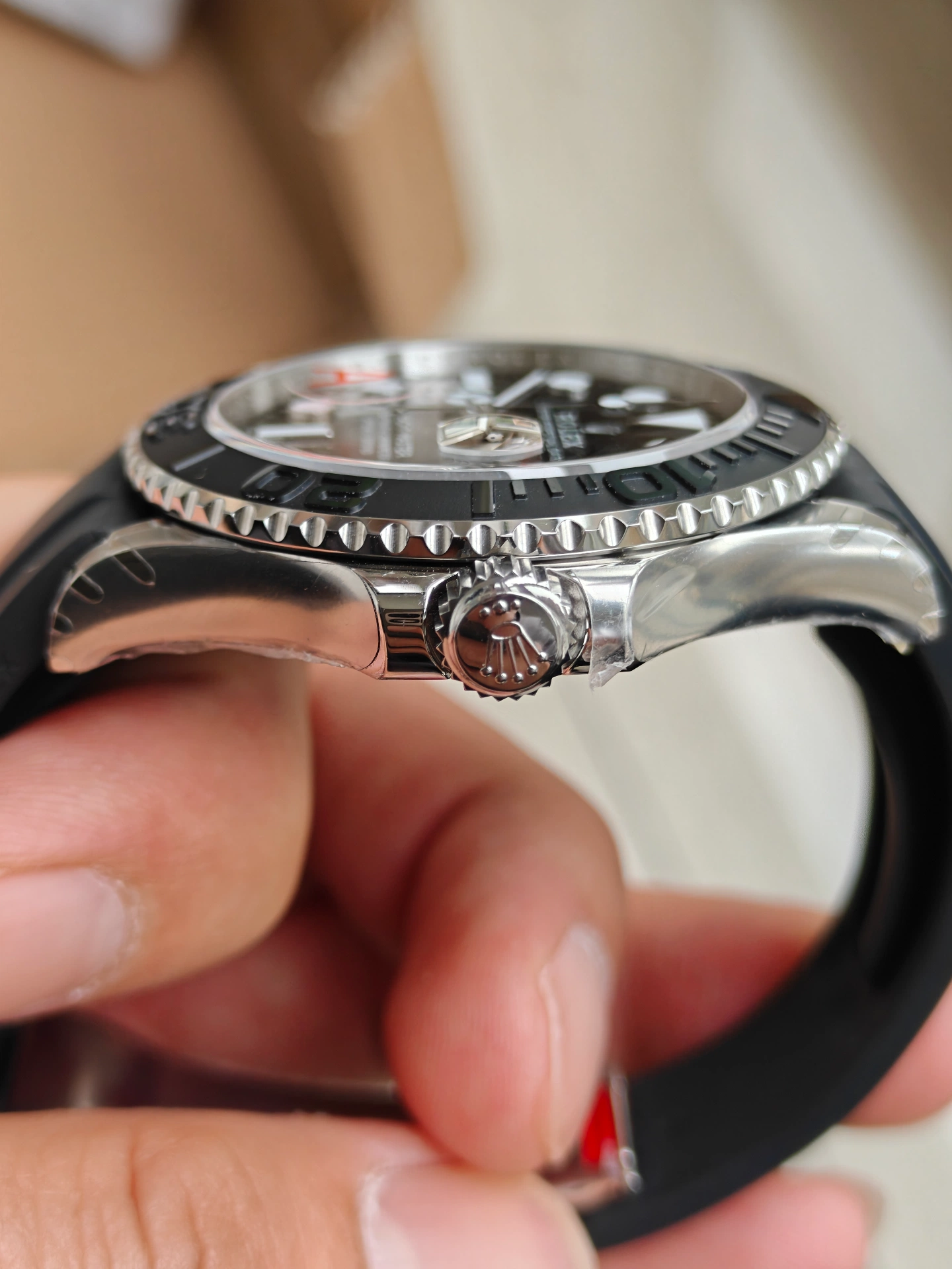 VSF White Gold Yacht-Master 42 crown and case side closeup coronet ceramic bezel