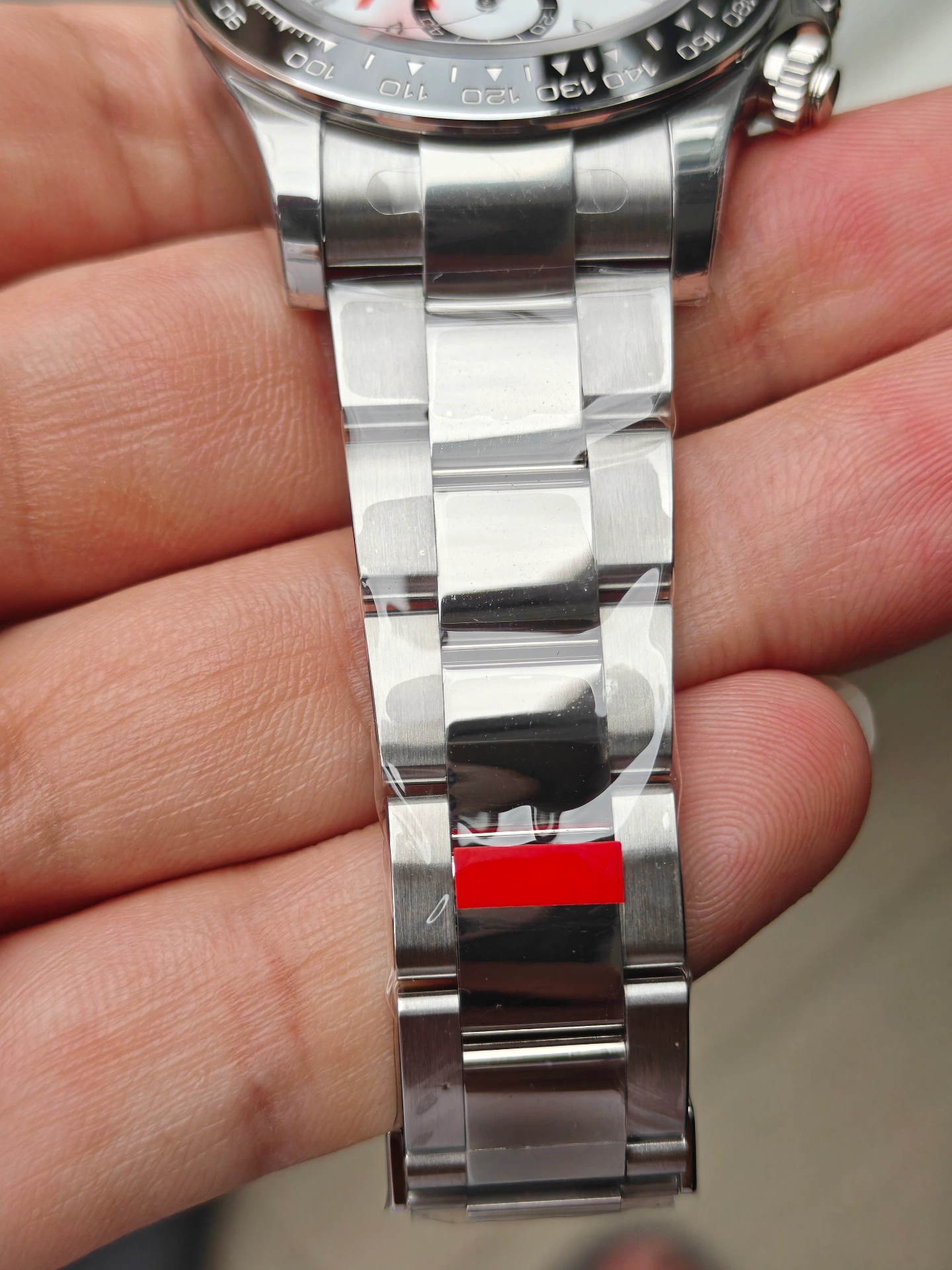 VSF V3 Panda Daytona 126500LN Oyster bracelet front view three-piece links center polished outer brushed with red sticker