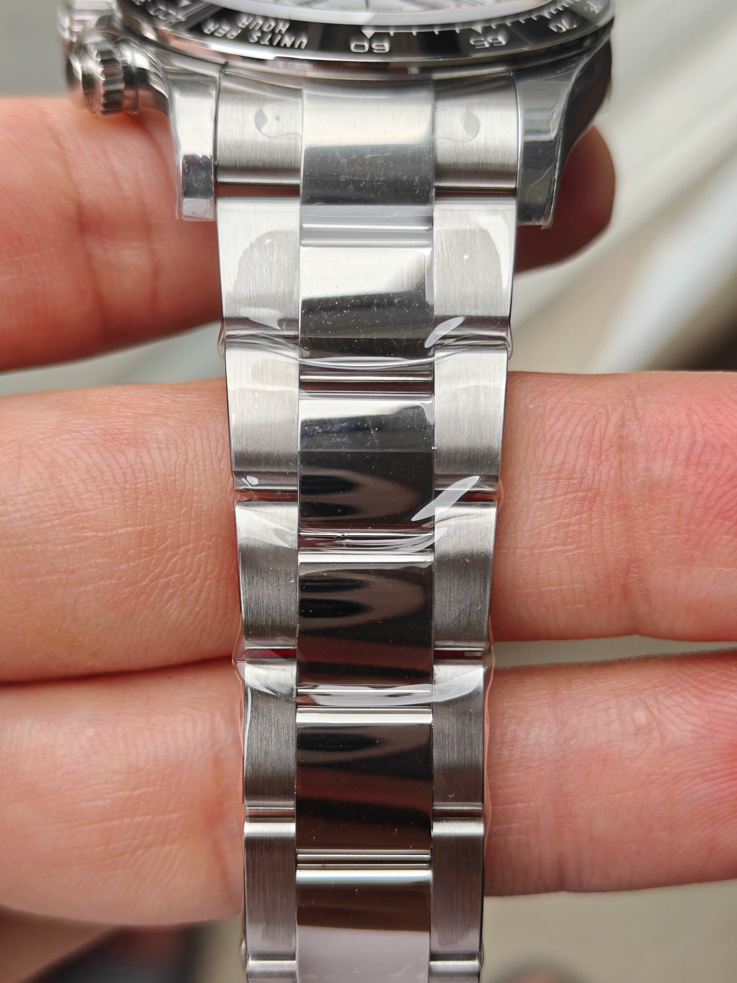VSF V3 Panda Daytona 126500LN bracelet side angle showing case to bracelet transition with brushed and polished finish