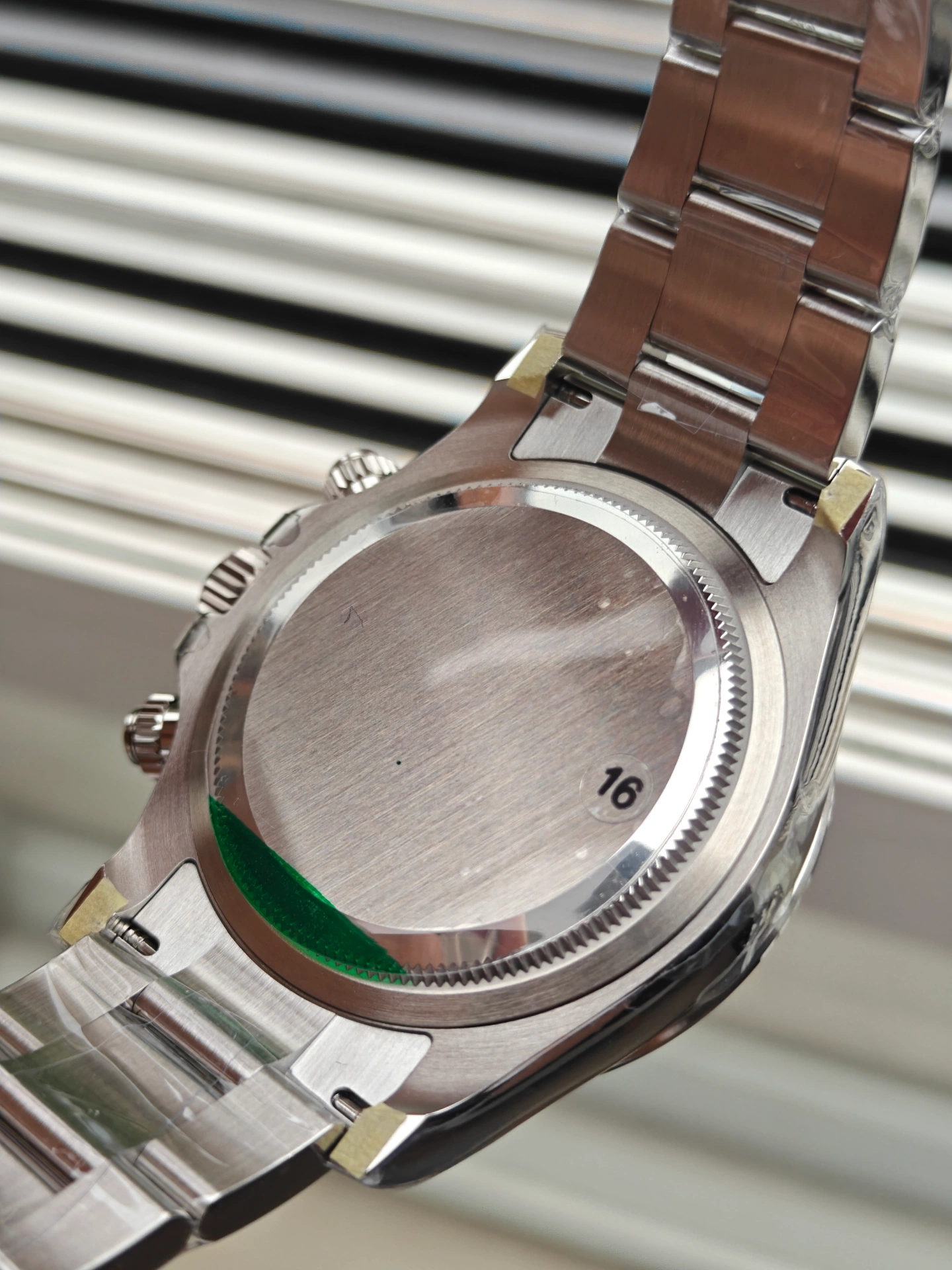 VSF V3 Panda Daytona 126500LN solid steel caseback closeup screw-down steel back with 16 engraving and green protective film