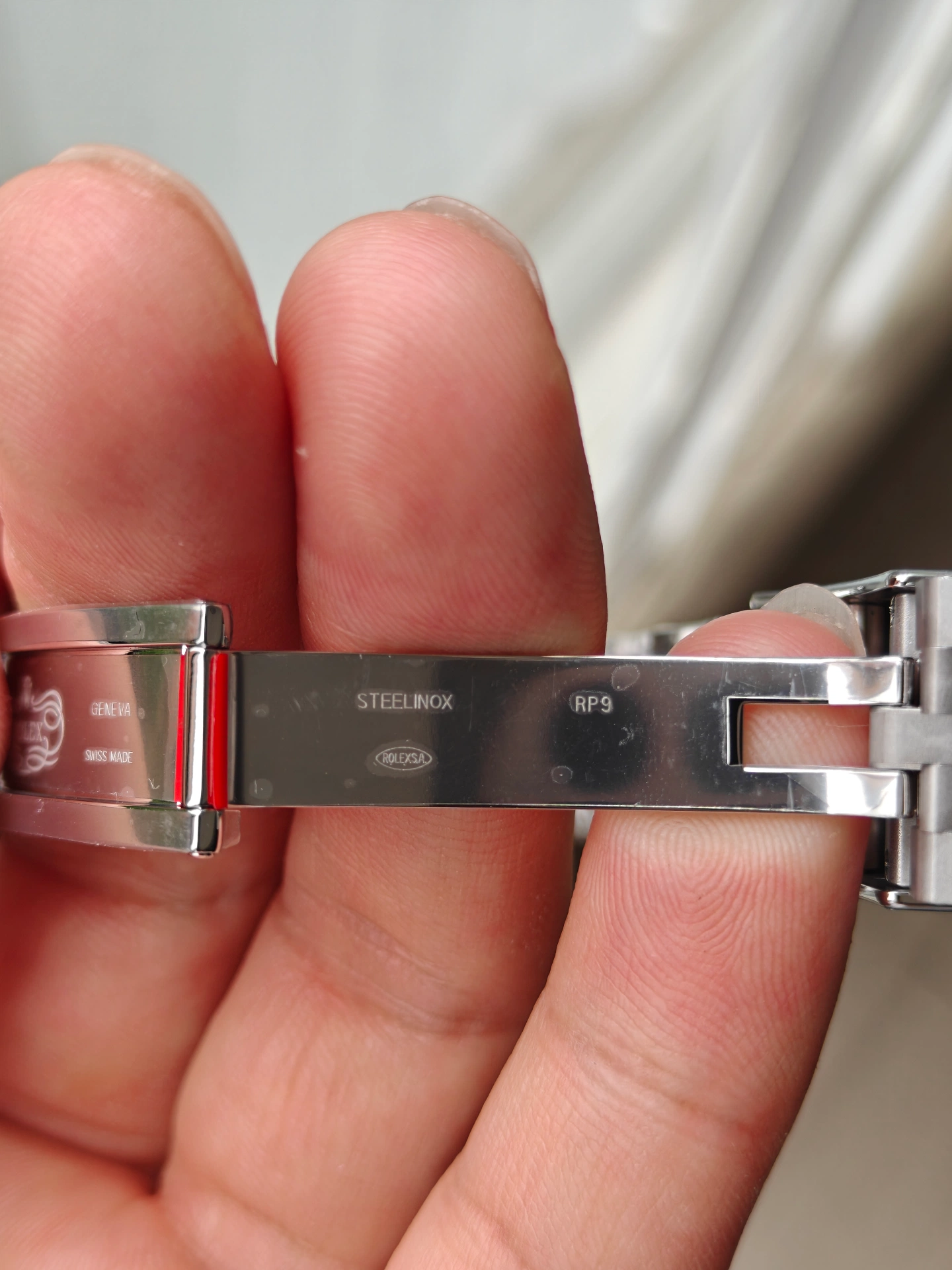 VSF V3 Panda Daytona 126500LN clasp production code RP9 closeup with STEELINOX and ROLEX S.A. engravings second batch code